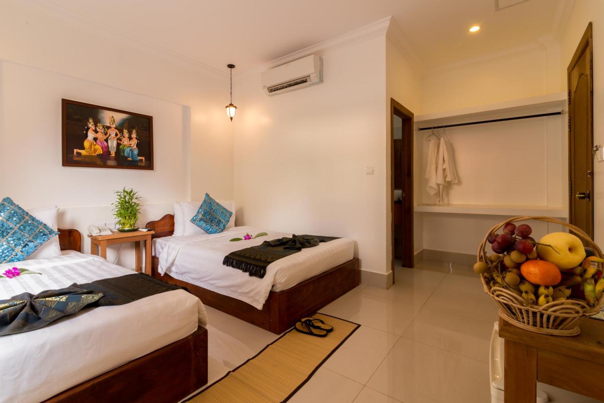 Plumeria Hotel & Spa Ciudad de Siem Riep Habitación foto