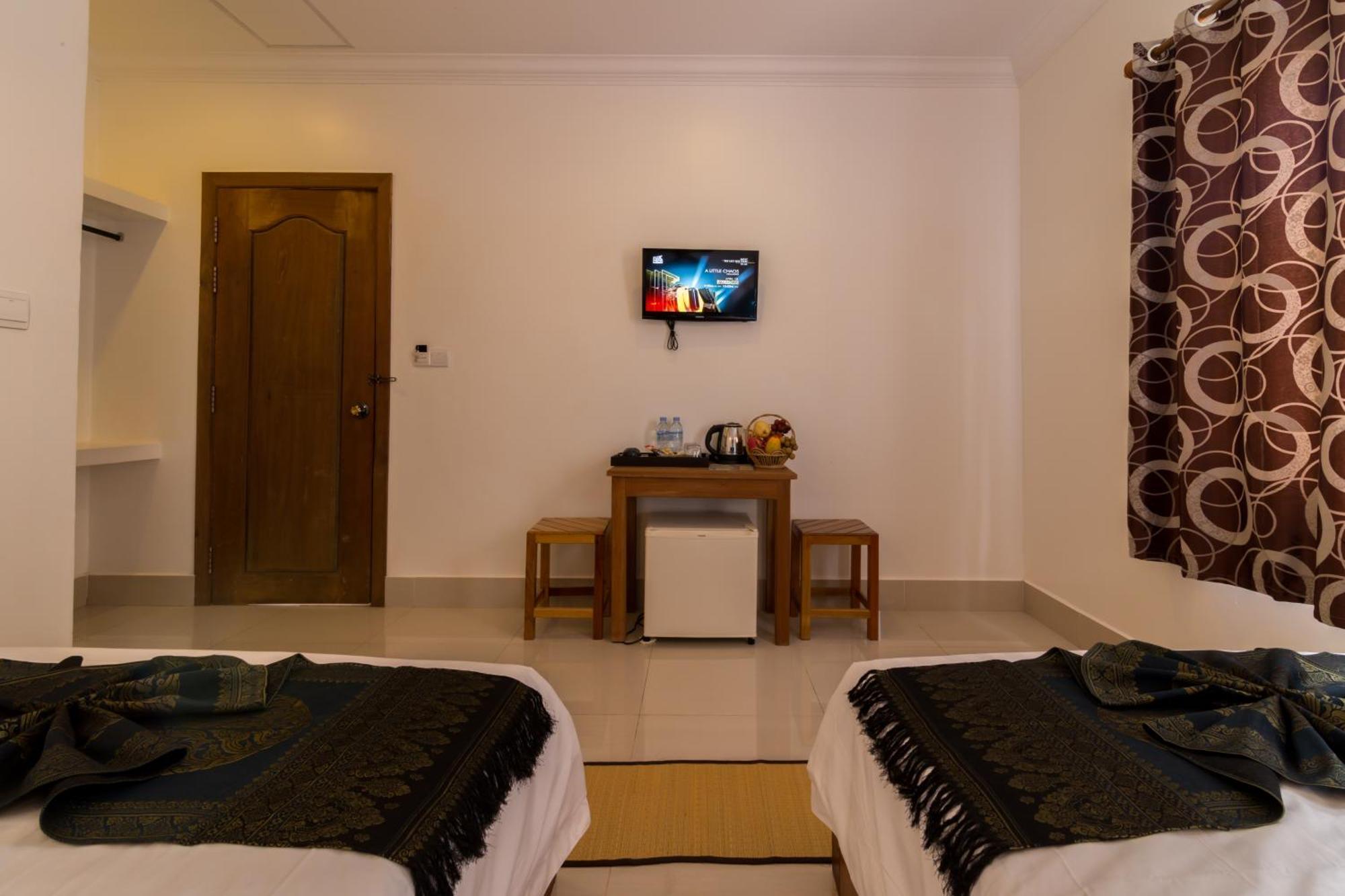 Plumeria Hotel & Spa Ciudad de Siem Riep Habitación foto
